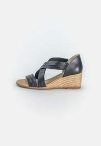 Shoe: 517/5-Wedged sandal with heel in and rope detail on sole