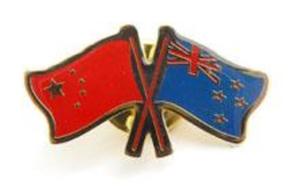 NZ and China Crossed Flags Badge