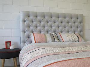 Deep buttoned upholstered bed