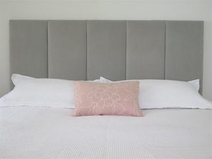 Velvet panelled headboard