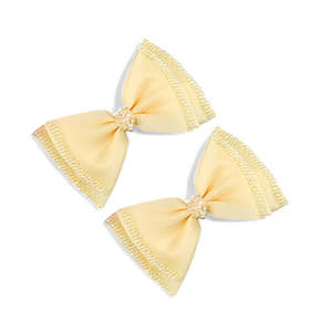 Clothing accessory: The Freesia Girls Bow Clip Set