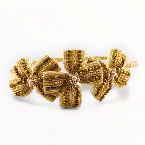 Clothing accessory: The Jolie Girls Gold Bow Headband