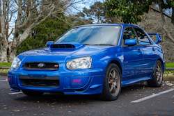 Car dealer - new and/or used: Subaru Impreza WRX STi V8 - 2003