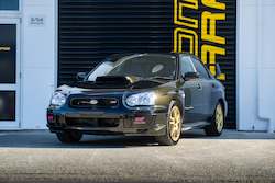 Car dealer - new and/or used: Subaru Impreza WRX STI - 2003