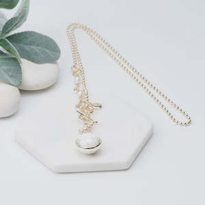 Womenswear: TBar White Bead