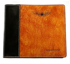 Leather or leather substitute goods: NZCAA Pilot Logbook Cover - 2 colour spine / front, laser engraved wings & name