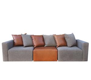 Vito modular sofa in loft charcoal and settler tapa leather