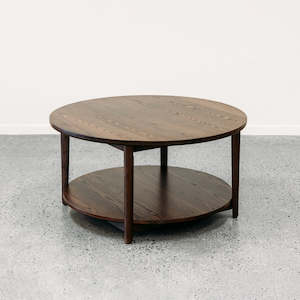 Furniture: Ghost round coffee table with shelf