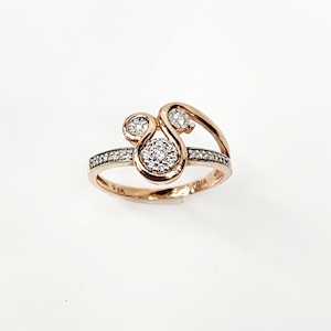 Jewellery: 9ct Rose Gold Fancy Swirl 0.16ct Diamond Ring