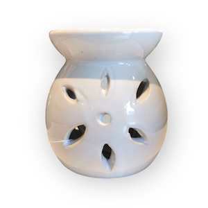 Mini white flower oil burner.