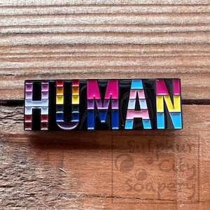 Soap manufacturing: HUMAN - Pride Pin.