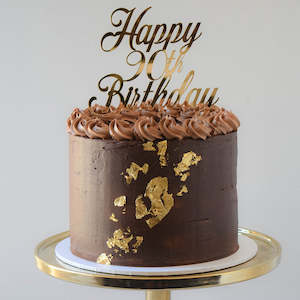 Cake icing or decorating: Chocolate Ganache & Gold Leaf Cake