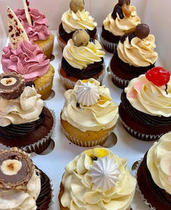 Mixed box of decadent cupcakes