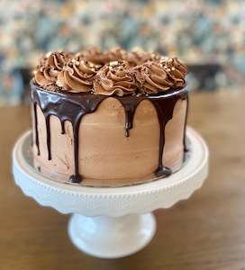 Cake icing or decorating: Ultimate Chocolate Mud Cake