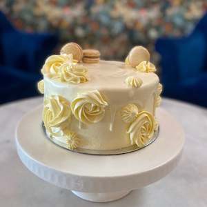 White 2 Layer Cake with Macarons