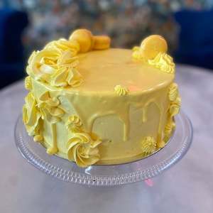 Yellow 2 Layer Cake with Macarons