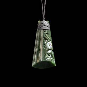 Jade Toki hand carved pendant