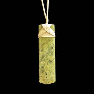 Jade Toki hand carved pendant by Nick and Mady