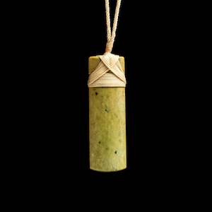 Jade Toki hand carved pendant by Nick and Mady