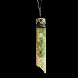 Jade Toki hand carved pendant by Nick and Mady