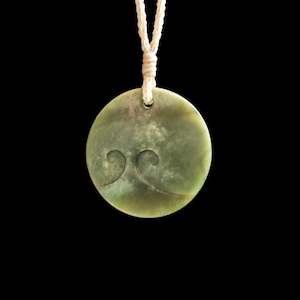 Jade disc pendant with korus by Nick and Mady