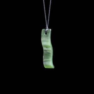 Small Wavy Jade Toki pendant handcarved by Elliot Lewis