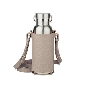 Karen Walker: Filigree Bottle Holder & Bottle | Macadamia