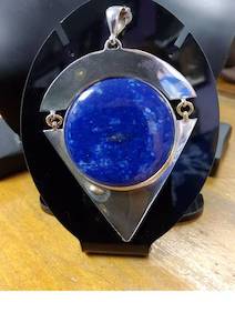 Products: Round Lapis set in Triangle Pendant