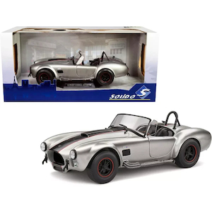 1: 18: 1965 Shelby AC Cobra 427 MKII Custom Silver Metallic with Red and Black Stripes 1: 18 By Solido