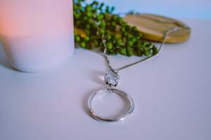 FOUR CORNERS NECKLACE - SILVER HOOP WITH GEM