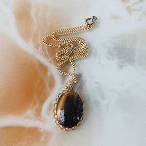 Second hand clothing: Tigers Eye Pendant