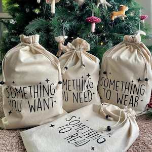 Internet only: Want Need Wear Read Reusable Gift Bags