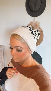 White leopard print pom pom beanie