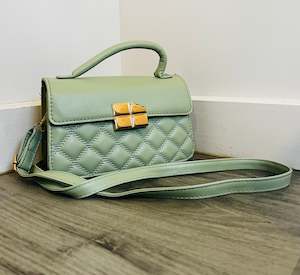 Green quilted flap square bag