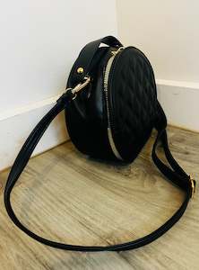 Womenswear: Black mini quilted circle bag