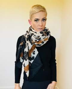 Womenswear: Leopard with stripe scarf