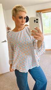 Womenswear: Linen blend check frill hem top