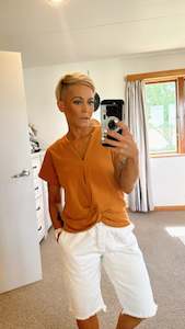 Tan twist hem top