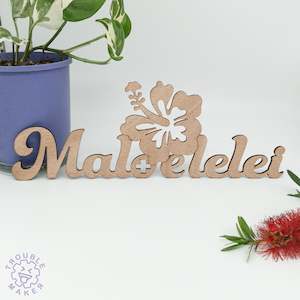 Maloelelei sign art, carved of wood