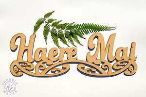 Haere Mai sign art, carved of wood