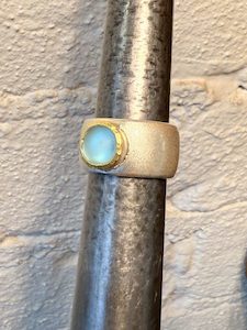 silver,22ct gold ring with blue Topaz