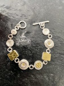 silver and 22 carat gold bracelet