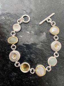 silver and 22 carat gold bracelet with pearls and aquamarine