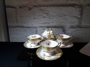 Antique: Five demi tasse cups and saucers