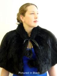 Possum fur cape with pompoms