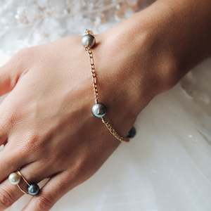 Event, recreational or promotional, management: Tahitian Black Pearl Gold Chain Bracelet