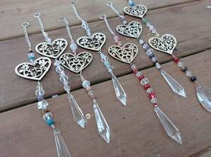 Store-based retail: Wooden Heart Sun Catchers