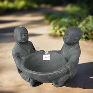 2 Monks Holding A Bowl