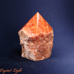 China, glassware and earthenware wholesaling: Orange Orchid Calcite Cut Base Point