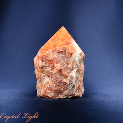 China, glassware and earthenware wholesaling: Orange Orchid Calcite Cut Base Point